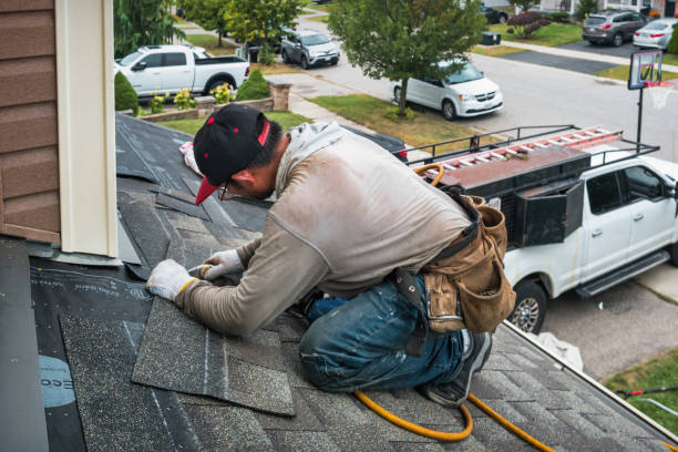 Professional Roofing technician working in Ashton, ID